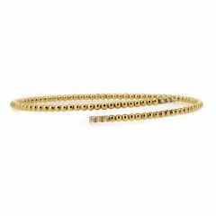Pulsera flexible modelo bolitas oro y diamantes