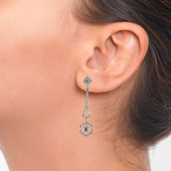 Pendientes de diamantes y topacio incoloro