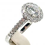 Solitario de diamante 0,60cts con orla de diamantes