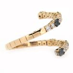 Anillo "serpiente" diamantes negros y blancos