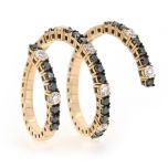 Anillo "serpiente" triple diamantes blancos y negros