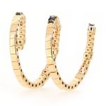 Anillo "serpiente" triple diamantes blancos y negros